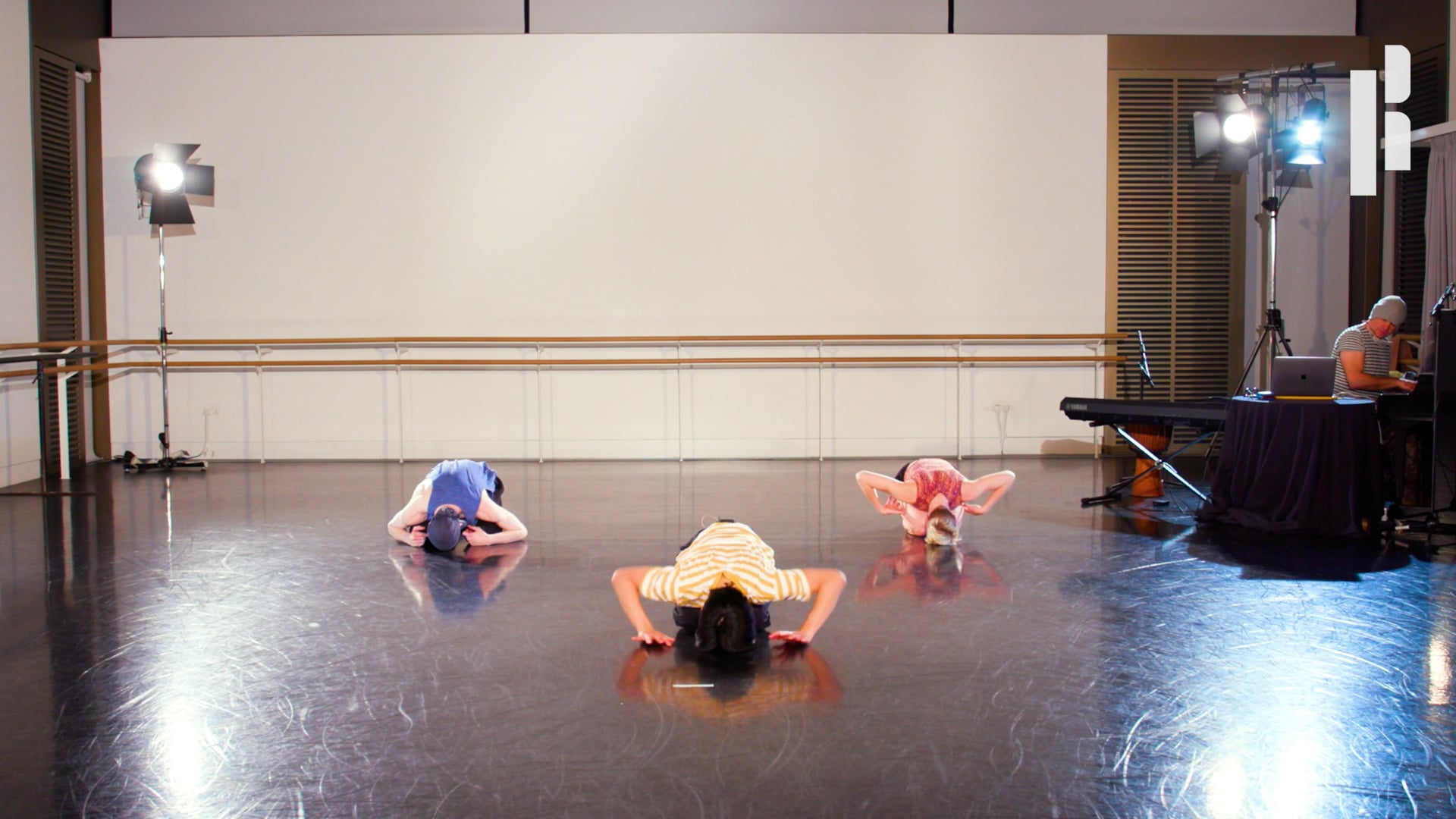 A group of people in a dance studio.