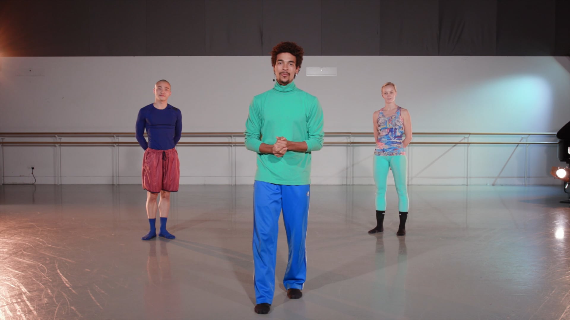 a man standing in front of a group of people.