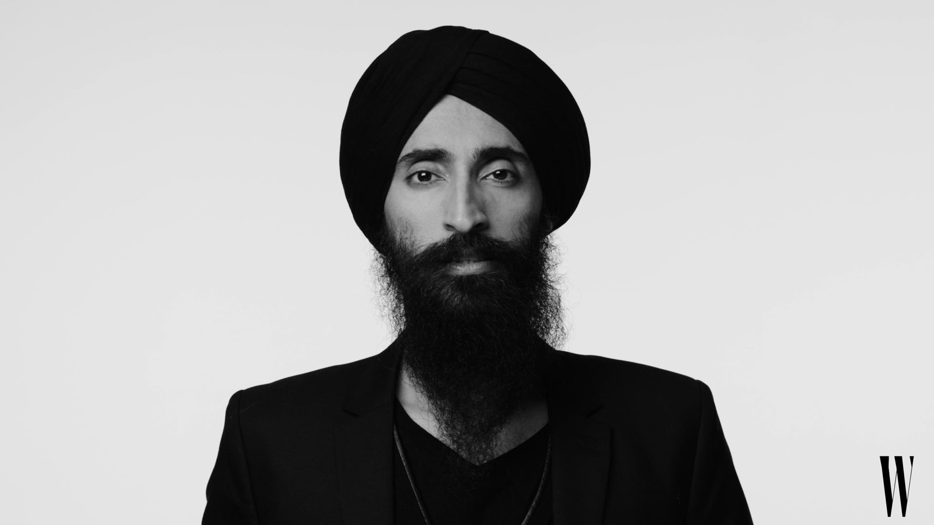 a man with a beard and a turban.