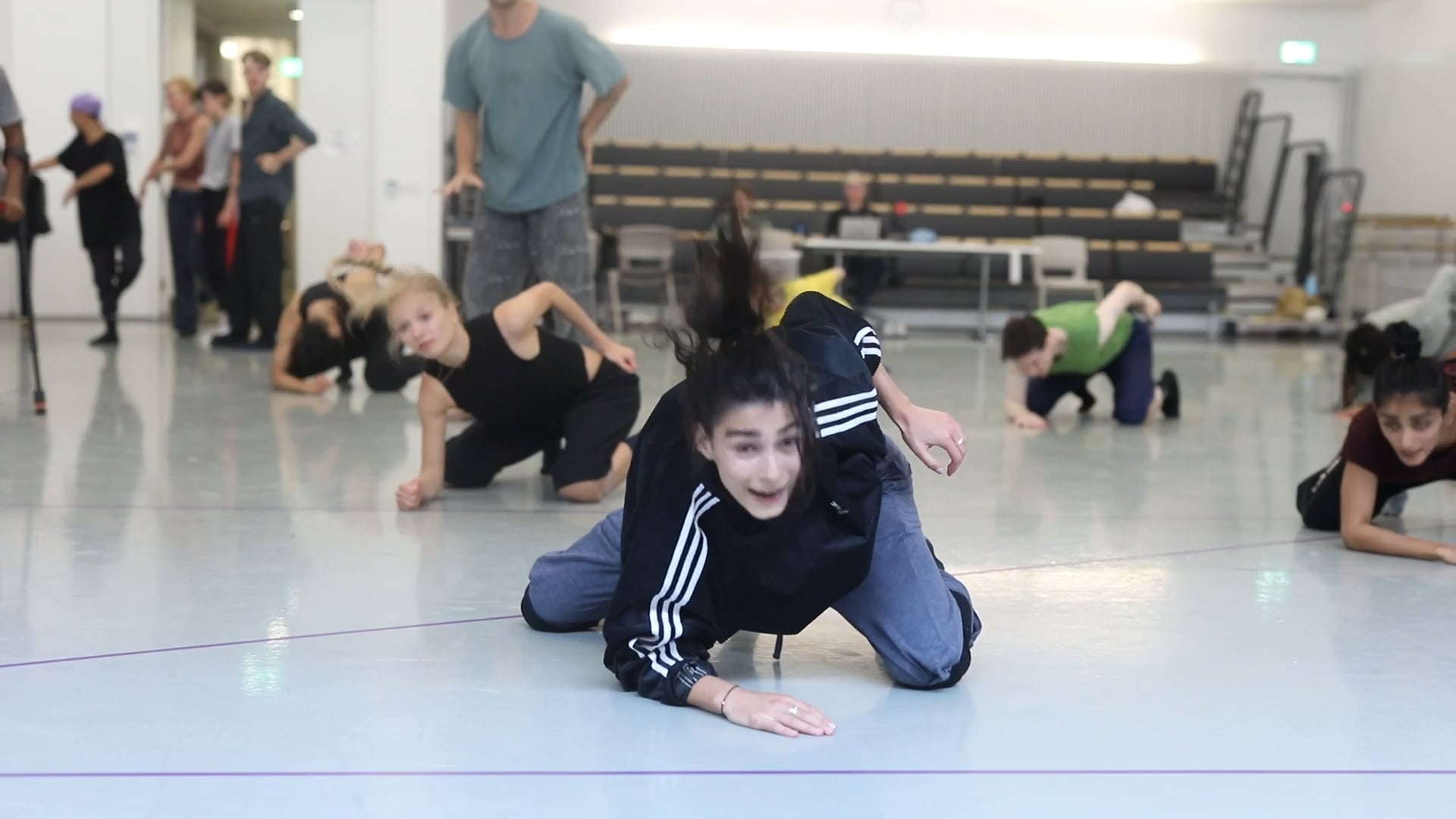 a group of people in a dance class.