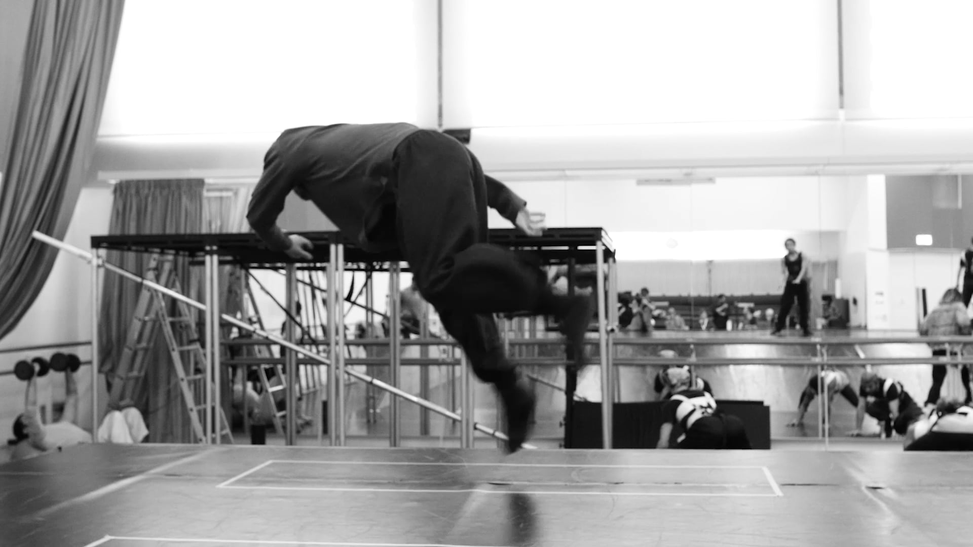 a man is doing a trick on a skateboard.