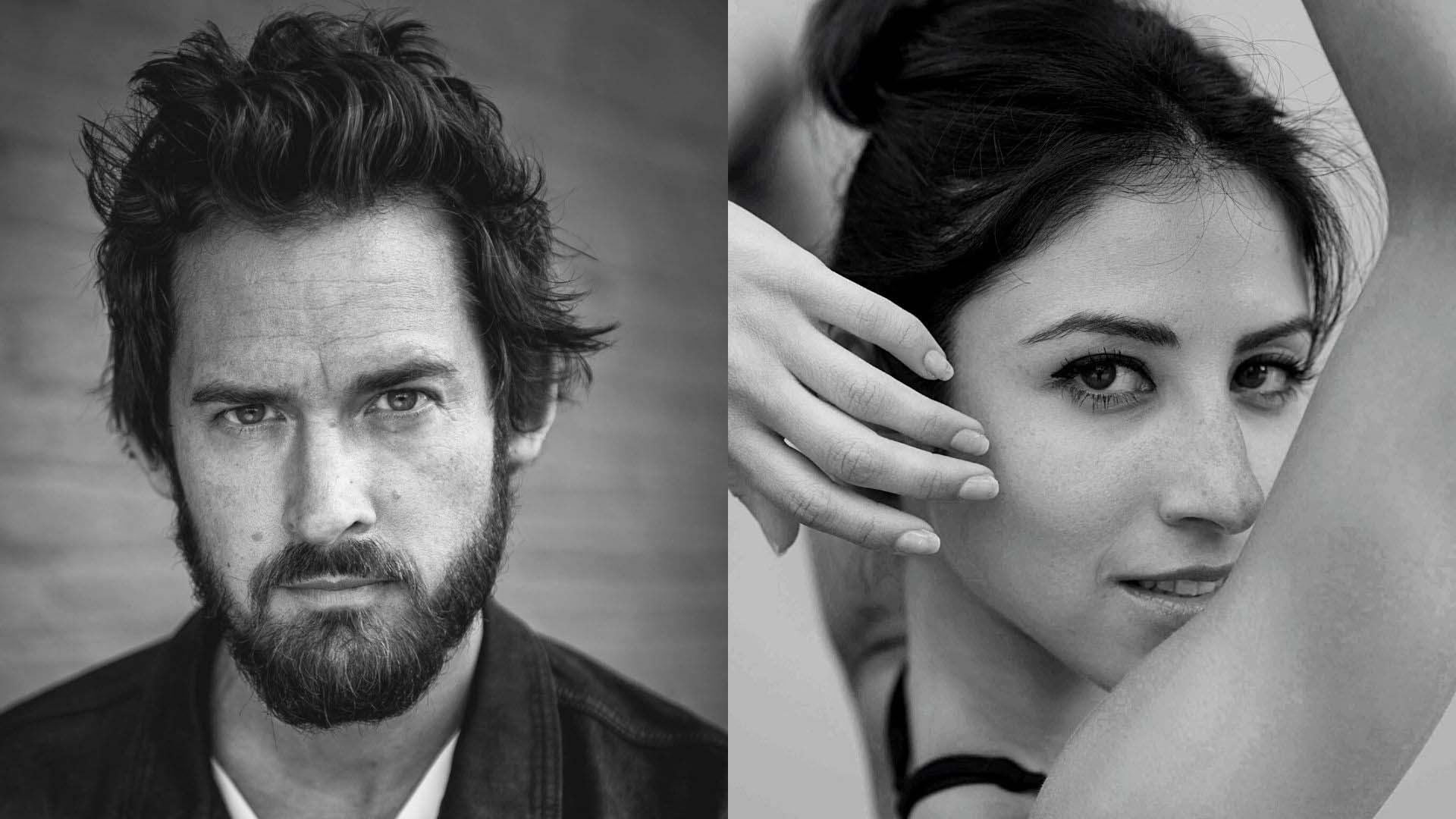a black and white photo of a woman and a man.