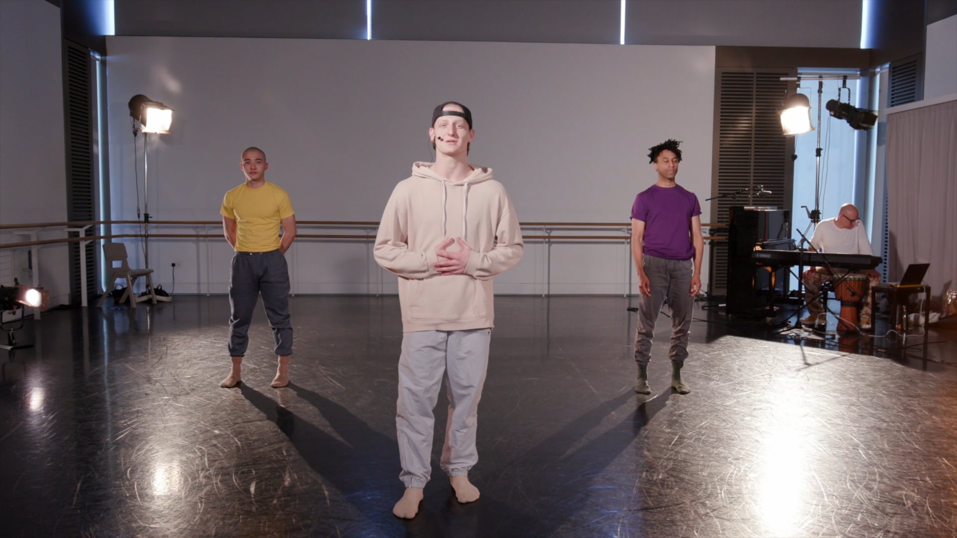a man standing in front of a group of people.