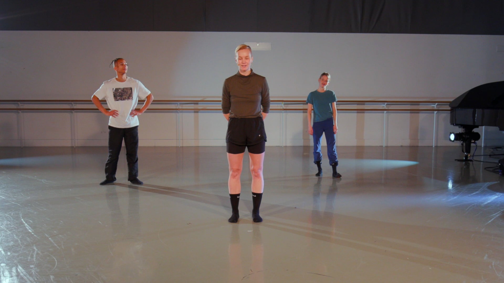 a group of men standing around each other.
