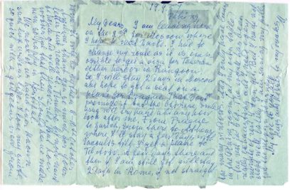 Handwritten letter on blue paper with text written in cursive. The paper appears slightly worn and folds are visible. The writing covers the entire page with margins left on the sides.