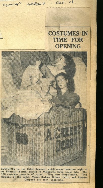 Newspaper clipping titled "Costumes in Time for Opening" from Women's Weekly. It shows two dancers, Barbara Grimes and Annette Chappell, unpacking costumes in a large crate labeled "A Green Depot.