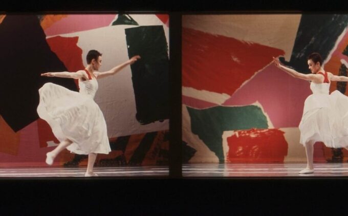 A dancer in a white dress performs on stage, captured in motion in four side-by-side frames against a vibrant, abstract background.